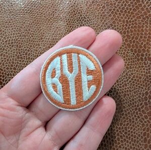 Orange and White Embroidered Patch "BYE"